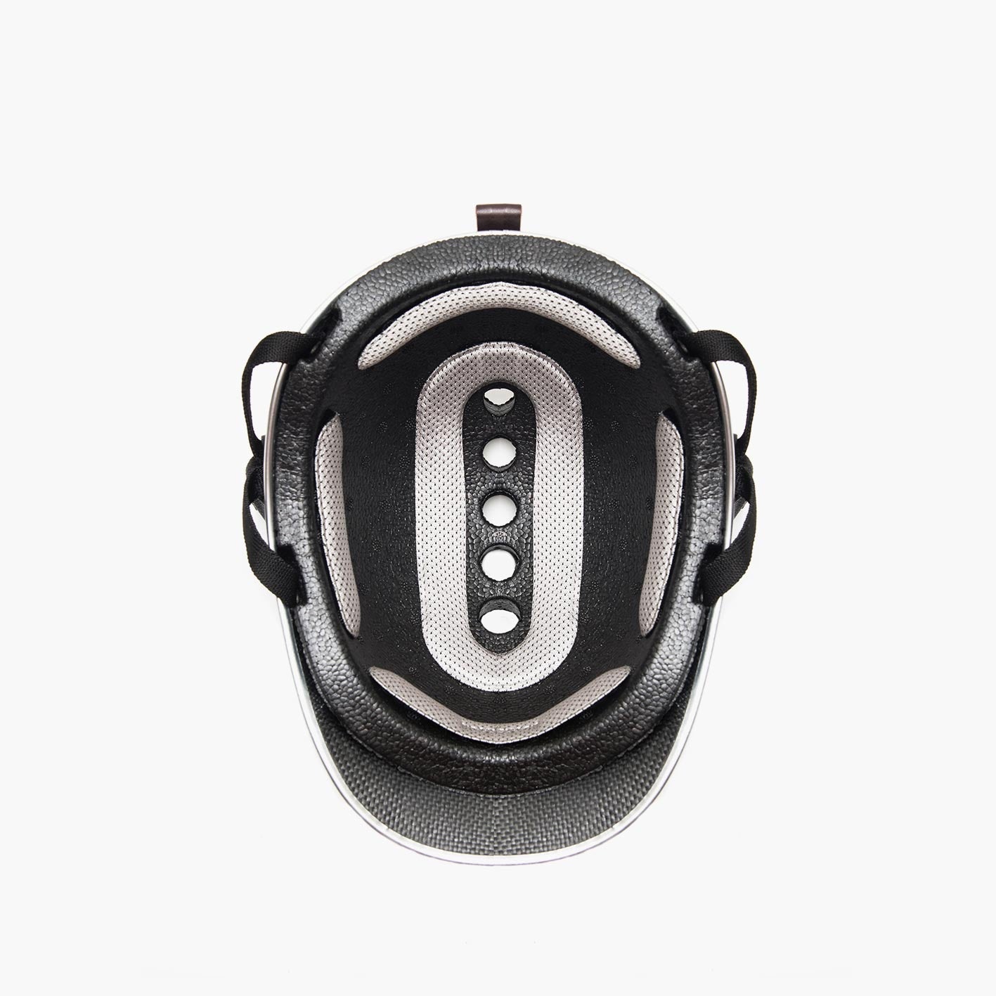 Interior of Dashel Carbon Fibre Edition bike helmet with multi-impact foam liner, fit pads and Fidlock magnetic buckle