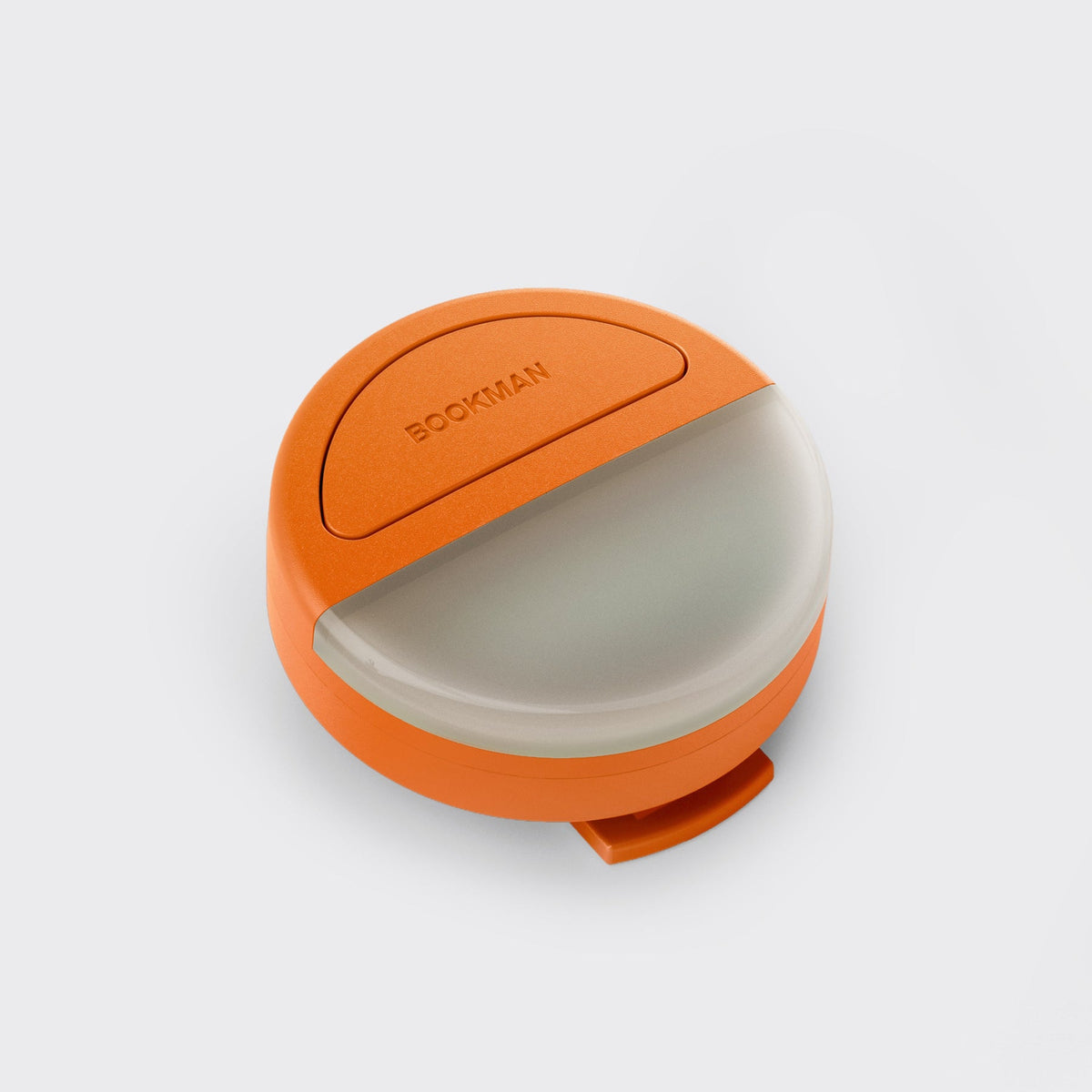 Angled view of the orange Bookman Eclipse wearable safety light