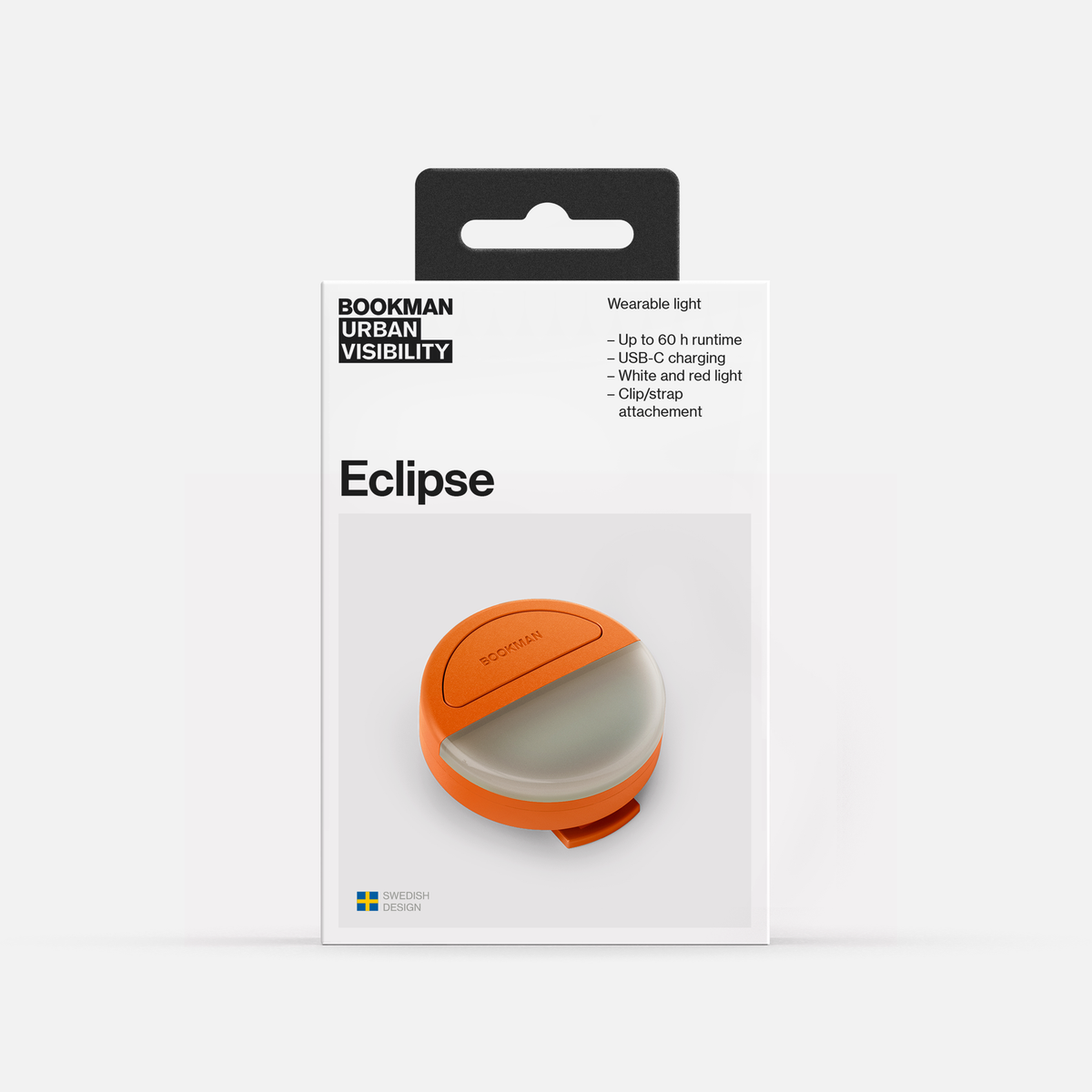 Bookman Eclipse rechargeable safety light in orange, shown in its packaging
